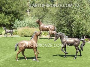 Prancing Delight sculpture of foal with flowing mane and tail with strong muscle details