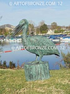 Fisherman bronze statue of tranquil pelican on bronze piling