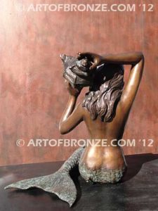 Bronze mermaid sculpture holding oyster shell for pond, pool or aquatic display