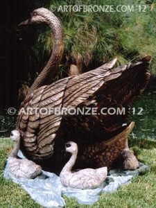 Swan Lake outdoor life-size garden statue of swan and playing cygnets