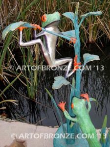 Jungle Gym two red-eyed tree frogs playing on branches for garden or outdoor display