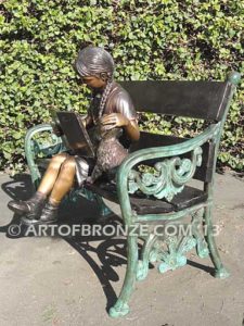 Love and Affection sculpture of young reader girl with dog and book