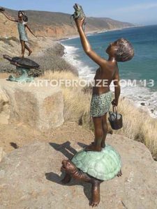 A Day to Remember Bronze sculpture of whimsical boy on turtle holding bucket of bullfrogs