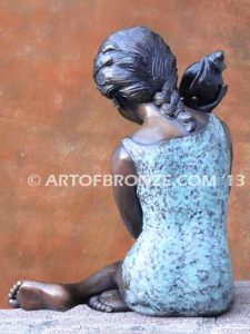 Ocean Sounds bronze sculpture for pool, garden or yard of young child holding conch shell