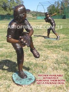 Home Run bronze sculpture of boy playing baseball hitting ball