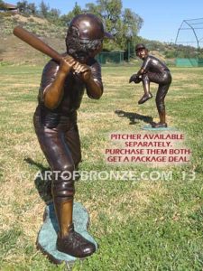 Home Run bronze sculpture of boy playing baseball hitting ball