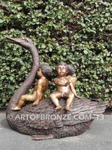 Fantasy bronze sculpture of playing cherubs on graceful swan