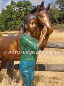 Dreams Come True bronze sculpture of girl petting her pony horse