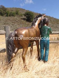 Dreams Come True bronze sculpture of girl petting her pony horse