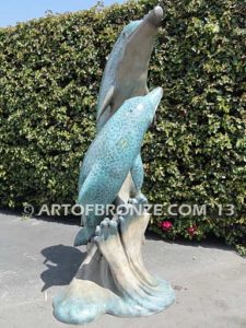 Jubilation bronze fine art gallery sculpture of dolphins, whales and porpoises