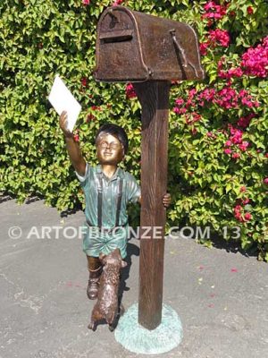 Letter to Grandma sculpture of dog and boy putting letter to grandma in mailbox