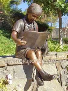 Love and Devotion sculpture of young reader girl with dog and book