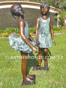 Dance Partners bronze sculpture of two ballerinas holding hands