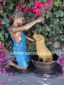 Bath time bronze sculpture fountain of boy washing his dog