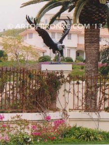 Alaskan Dinner bronze sculpture of monumental life-size eagle.