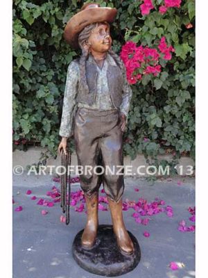 Wild West Spirit bronze sculpture of western cowgirl wearing a Stetson and holding a rope