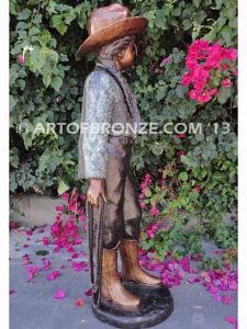 Wild West Spirit bronze sculpture of western cowgirl wearing a Stetson and holding a rope