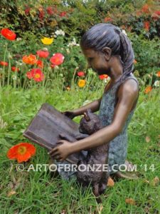 Shared Memories bronze sculpture of girl playing with her cat