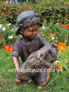 Play Pal bronze sculpture of young boy holding his dog