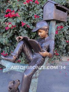 Waiting Patiently bronze sculpture mailbox of boy reading book with his dog