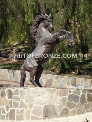 Wild Country sculpture of reared horse with forelegs off the ground and hind legs attached bronze base