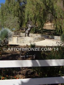 Wild Country sculpture of reared horse with forelegs off the ground and hind legs attached bronze base