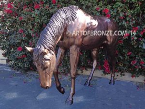 Thoroughbred bronze sculpture of grazing horse for ranch or equestrian center