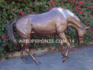 Thoroughbred bronze sculpture of grazing horse for ranch or equestrian center