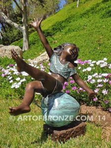 Favorite Student bronze sculpture of girl atop apple