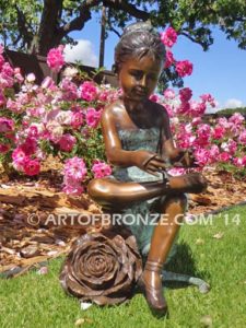 Blooming Youth III bronze sculpture of young ballerina sitting tying her slipper