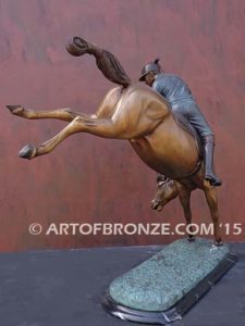 Change of Direction sculpture of polo player riding his leaping polo pony attached to a marble base