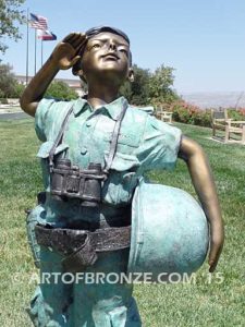 Home of the Brave bronze sculpture of saluting boy dressed up playing soldier