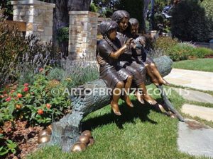 Special Touch bronze sculpture of three kids sitting on log with a injured baby bird in their hands