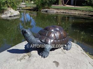 Great One sculpture of large bronze turtle that can spray water from mouth into fountain