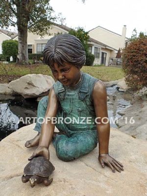 Ready for the Race bronze sculpture of boy playing with his pet painted turtle