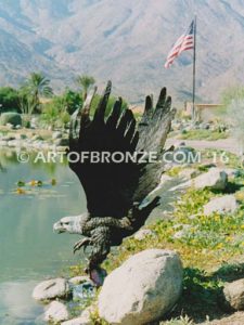 Alaskan Dinner bronze sculpture of monumental life-size eagle.