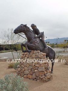 Show Jumper Olympic equestrian bronze horse and rider equestrian statue for Griffin Ranch in La Quinta, CA