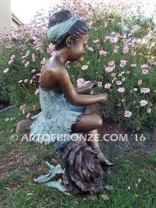 Blooming Youth side view D bronze sculpture of young ballerina sitting tying her slipper