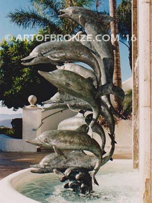 Dolphin Jubilation bronze Art in Public places monument of 9 nine leaping dolphins over 10 ft. tall