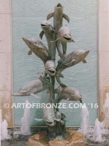 Dolphin Jubilation bronze Art in Public places monument of 9 nine leaping dolphins over 10 ft. tall