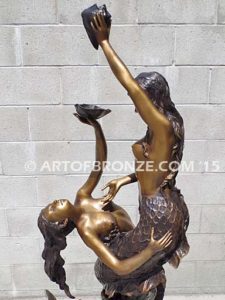 Bronze mermaid sculpture holding oyster shell for pond, pool or aquatic display