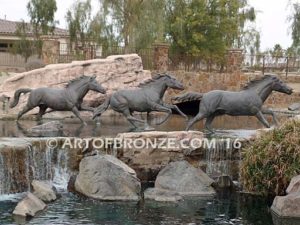 Running Spirit bronze sculpture of running thoroughbreds for Griffin Ranch in La Quinta, CA