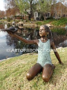 New Surprise sculpture of teenage girl in bathing suit and shell