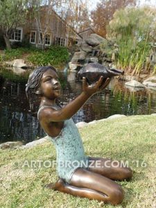 New Surprise sculpture of teenage girl in bathing suit and shell