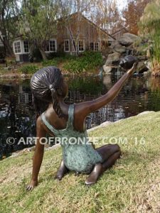 New Surprise sculpture of teenage girl in bathing suit and shell