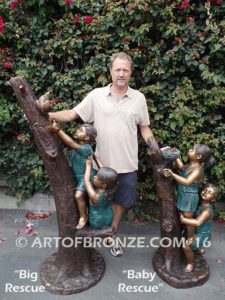 Big Rescue both Bronze statue of boy and girl rescuing with cat in tree