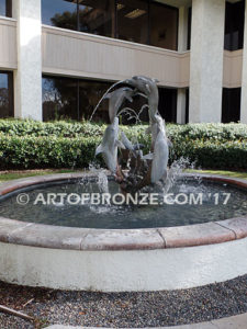 Round and Round bronze fine art gallery sculpture of dolphins, whales and porpoises