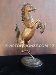 Legendary Spirit sculpture of reared horse on one leg attached to a marble base