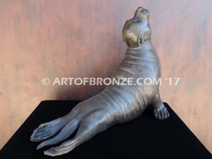 Sunbather bronze sea lion and seal mascot sculpture for zoo, university or school mascot