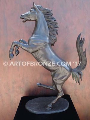 Legendary Spirit sculpture of reared horse on one leg attached to a marble base